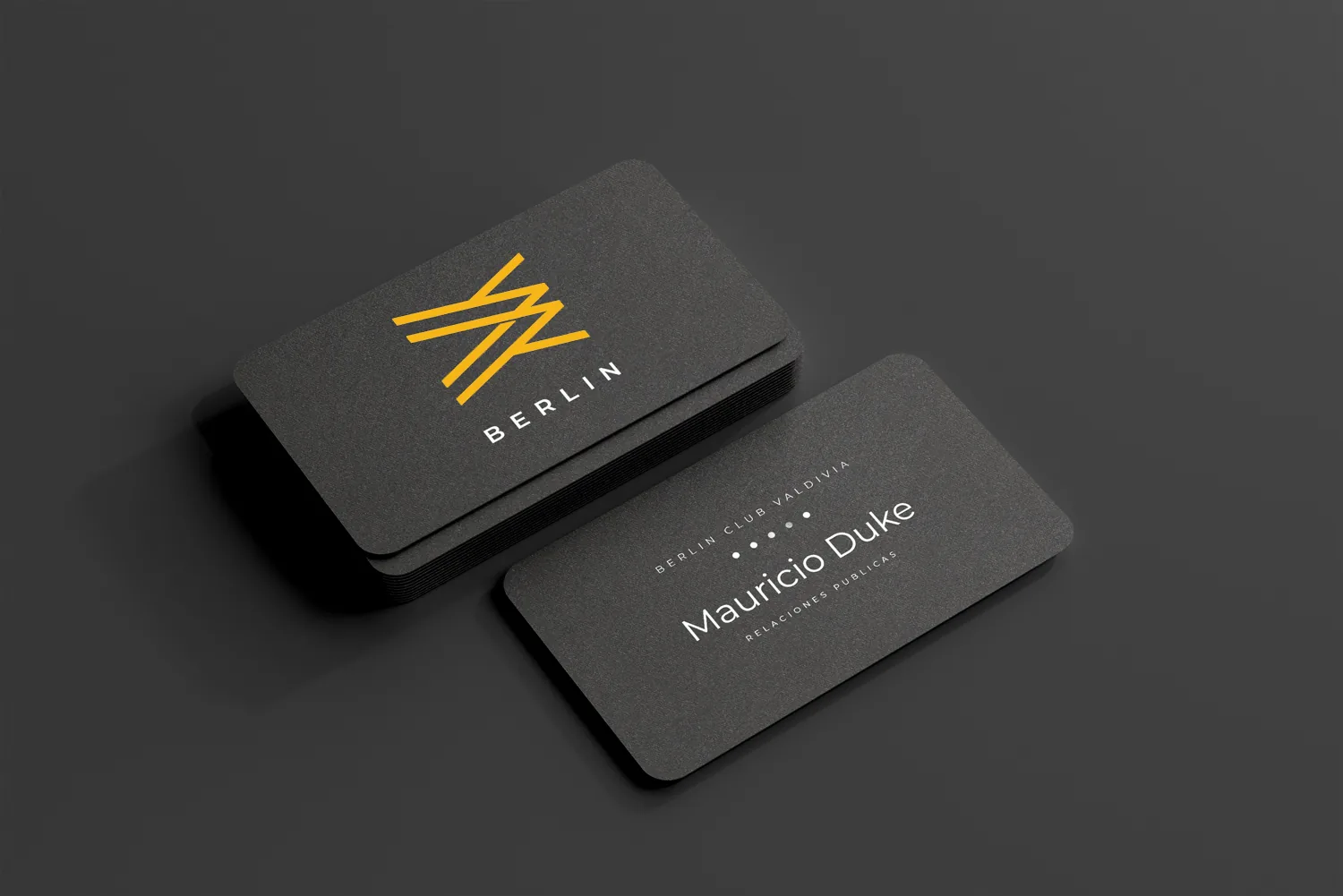 Dark Berlin Club business cards with the yellow mark