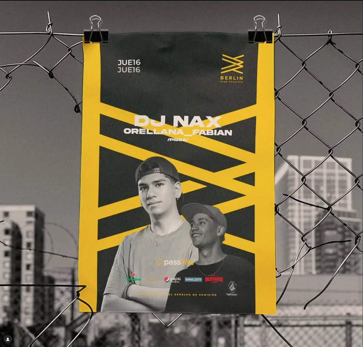 Yellow Berlin Club DJ poster hanging on a chain-link fence